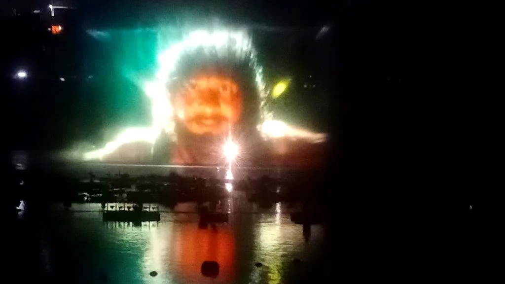 Projected visual content on a water screen