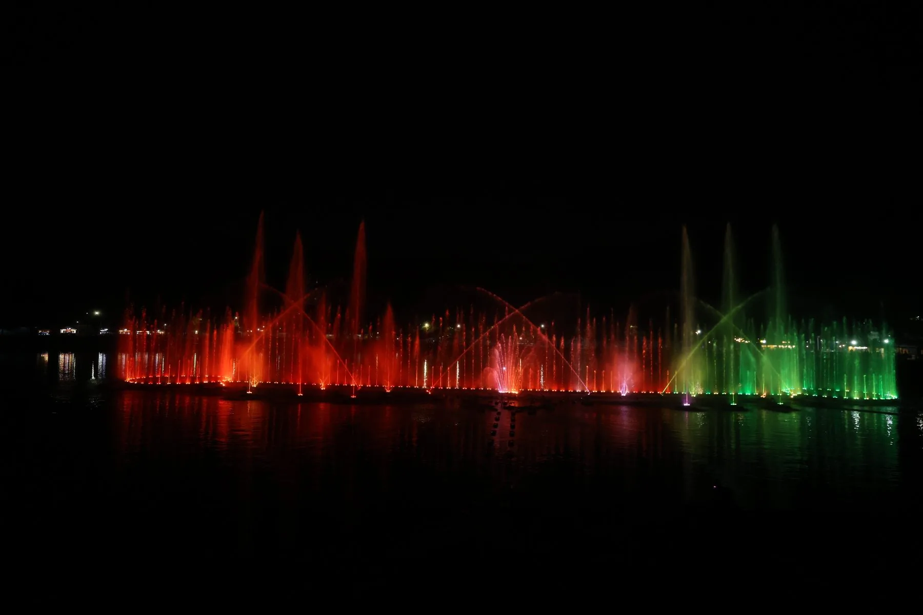Red fountain crescendo at Upvan Lake, Thane